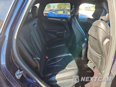 Zdjęcie 11 z 14 samochodu: 2017 LINCOLN MKC PREMIERE VIN:5LMCJ1C97HUL55433 - miniatura