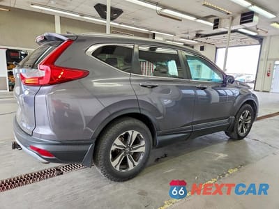 Trzecie zdjęcie samochodu z tyłu: 2017 HONDA CR-V LX VIN:2HKRW1H38HH000787 - miniatura