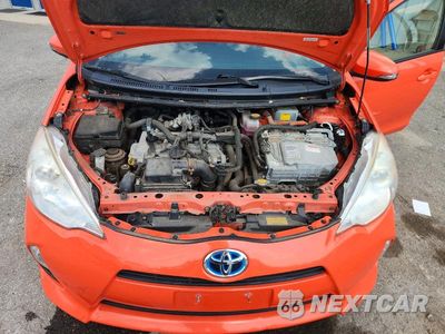 Zdjęcie 11 z 12 samochodu: 2013 TOYOTA PRIUS C FOUR VIN:JTDKDTB30D1045851 - miniatura