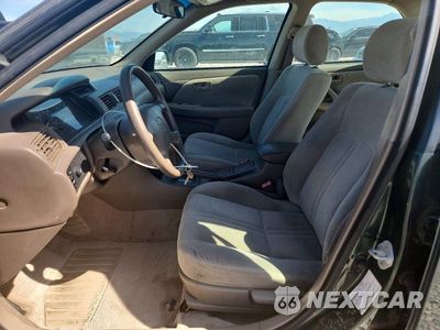 Zdjęcie 7 z 12 samochodu: 1999 TOYOTA CAMRY CE VIN:4T1BG22KXXU869069 - miniatura