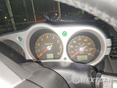 Zdjęcie 9 z 13 samochodu: 2004 NISSAN 350Z BASE VIN:JN1AZ34D74M102390 - miniatura