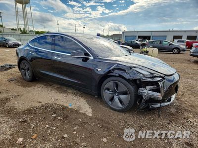 Czwarte zdjęcie samochodu z boku: 2020 TESLA MODEL 3 VIN:5YJ3E1EB6LF670432 - miniatura