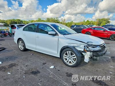 Czwarte zdjęcie samochodu z boku: 2017 VOLKSWAGEN JETTA S VIN:3VW2B7AJ6HM293590 - miniatura