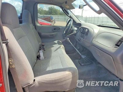 Zdjęcie 10 z 12 samochodu: 2003 FORD F150 VIN:1FTRF182X3NB65319 - miniatura