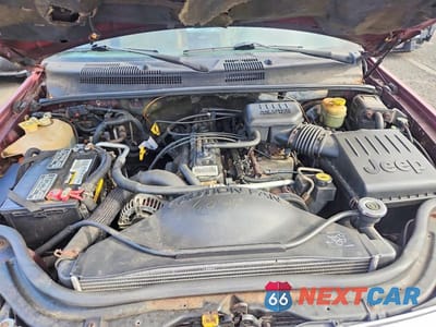 Zdjęcie 12 z 13 samochodu: 1999 JEEP GRAND CHEROKEE LAREDO VIN:1J4GW58S7XC678876 - miniatura