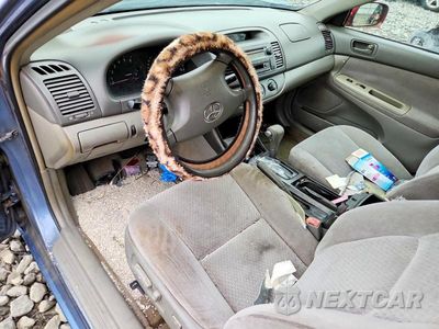 Zdjęcie 8 z 12 samochodu: 2004 TOYOTA CAMRY LE VIN:4T1BE32K04U927312 - miniatura