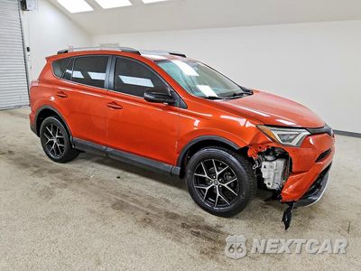 Czwarte zdjęcie samochodu z boku: 2016 TOYOTA RAV4 SE VIN:2T3JFREV0GW441404 - miniatura