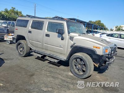 Czwarte zdjęcie samochodu z boku: 2003 HUMMER H2 VIN:5GRGN23U53H122738 - miniatura