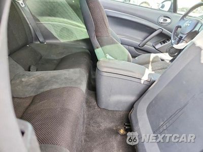 Zdjęcie 10 z 13 samochodu: 2008 MITSUBISHI ECLIPSE GT VIN:4A3AK34T28E025482 - miniatura