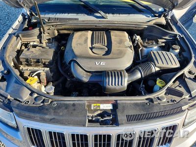 Zdjęcie 12 z 13 samochodu: 2014 JEEP GRAND CHEROKEE LIMITED VIN:1C4RJFBG1EC411611 - miniatura