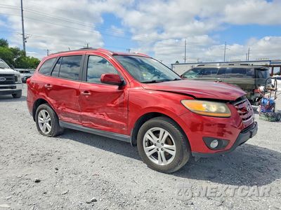 Czwarte zdjęcie samochodu z boku: 2010 HYUNDAI SANTA FE SE VIN:5NMSHDAG9AH345887 - miniatura