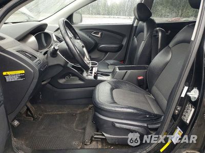 Zdjęcie 7 z 14 samochodu: 2010 HYUNDAI TUCSON GLS VIN:KM8JUCAC7AU067946 - miniatura