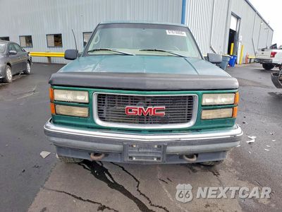 Piąte zdjęcie samochodu w środku: 1999 GMC SUBURBAN K1500 VIN:1GKFK16R9XJ728425 - miniatura