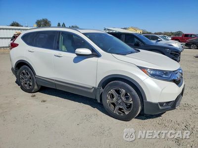 Czwarte zdjęcie samochodu z boku: 2018 HONDA CR-V TOURING VIN:2HKRW2H99JH625618 - miniatura