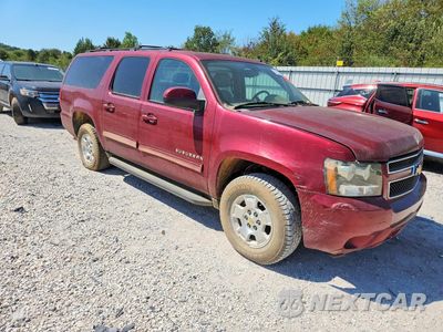 Czwarte zdjęcie samochodu z boku: 2010 CHEVROLET SUBURBAN K1500 LT VIN:1GNUKJE37AR138899 - miniatura