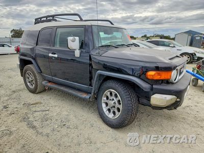 Czwarte zdjęcie samochodu z boku: 2011 TOYOTA FJ CRUISER BASE VIN:JTEBU4BF4BK107822 - miniatura