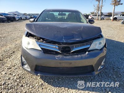Piąte zdjęcie samochodu w środku: 2014 TOYOTA CAMRY HYBRID VIN:4T1BD1FKXEU107001 - miniatura