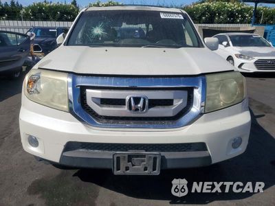 Piąte zdjęcie samochodu w środku: 2011 HONDA PILOT TOURING VIN:5FNYF3H96BB023339 - miniatura