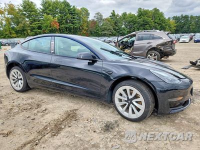 Czwarte zdjęcie samochodu z boku: 2023 TESLA MODEL 3 VIN:5YJ3E1EA6PF450687 - miniatura
