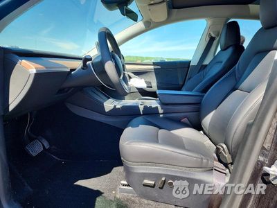 Zdjęcie 7 z 12 samochodu: 2024 TESLA MODEL Y VIN:7SAYGDEEXRA283886 - miniatura