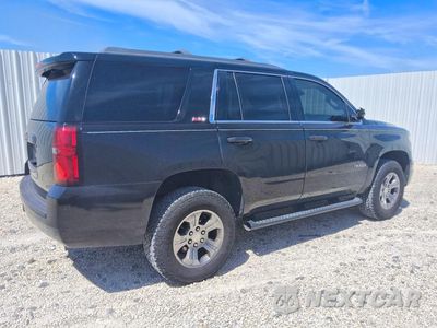 Trzecie zdjęcie samochodu z tyłu: 2019 CHEVROLET TAHOE K1500 LT VIN:1GNSKBKC2KR368465 - miniatura