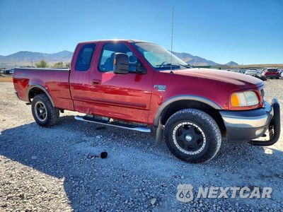 Czwarte zdjęcie samochodu z boku: 2002 FORD F150 VIN:1FTRX18L62NB00200 - miniatura