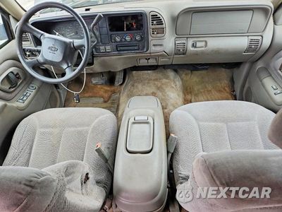 Zdjęcie 8 z 13 samochodu: 1999 CHEVROLET TAHOE K1500 VIN:1GNEK13R3XJ463200 - miniatura