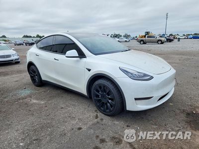 Czwarte zdjęcie samochodu z boku: 2022 TESLA MODEL Y VIN:7SAYGDEE3NA020164 - miniatura