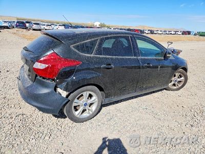 Trzecie zdjęcie samochodu z tyłu: 2014 FORD FOCUS SE VIN:1FADP3K25EL285688 - miniatura