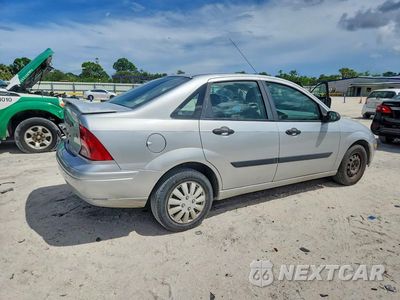 Trzecie zdjęcie samochodu z tyłu: 2002 FORD FOCUS LX VIN:1FAFP33P32W307037 - miniatura