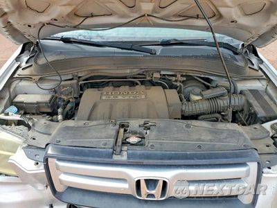 Zdjęcie 12 z 13 samochodu: 2006 HONDA PILOT EX VIN:2HKYF18746H520559 - miniatura