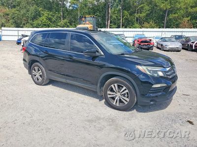 Czwarte zdjęcie samochodu z boku: 2017 HONDA PILOT EXLN VIN:5FNYF5H78HB047693 - miniatura