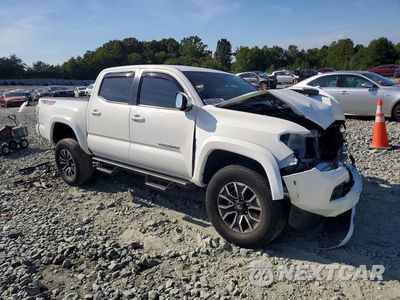 Czwarte zdjęcie samochodu z boku: 2021 TOYOTA TACOMA TRD SPORT VIN:3TYCZ5AN0MT012151 - miniatura
