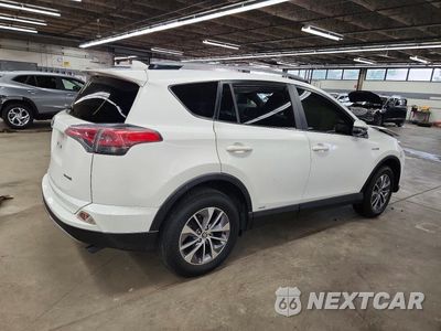 Trzecie zdjęcie samochodu z tyłu: 2017 TOYOTA RAV4 HYBRID LE PLUS VIN:JTMRJREV7HD132884 - miniatura