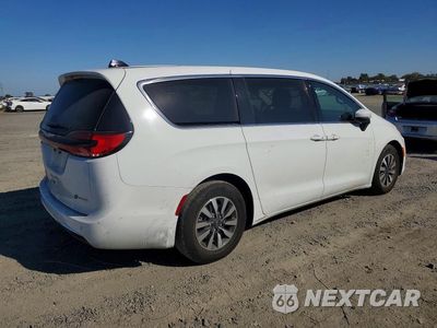Trzecie zdjęcie samochodu z tyłu: 2023 CHRYSLER PACIFICA HYBRID TOURING L VIN:2C4RC1L7XPR558970 - miniatura