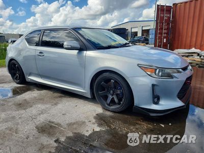 Czwarte zdjęcie samochodu z boku: 2014 SCION TC 10 SERIES VIN:JTKJF5C70E3066653 - miniatura