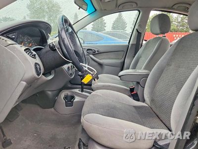 Zdjęcie 7 z 13 samochodu: 2002 FORD FOCUS ZTS VIN:1FAFP38322W151420 - miniatura