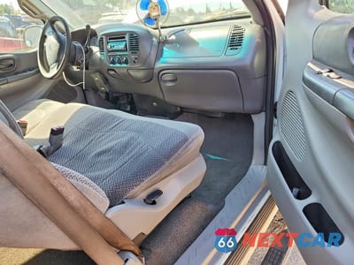 Zdjęcie 8 z 12 samochodu: 2000 FORD F150 VIN:1FTRX17L0YKA27272 - miniatura