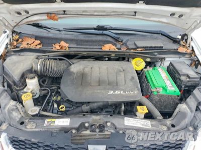 Zdjęcie 12 z 13 samochodu: 2017 DODGE GRAND CARAVAN SXT VIN:2C4RDGCG9HR825744 - miniatura