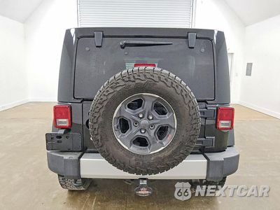 Zdjęcie 6 z 13 samochodu: 2013 JEEP WRANGLER UNLIMITED SAHARA VIN:1C4BJWEG7DL655792 - miniatura