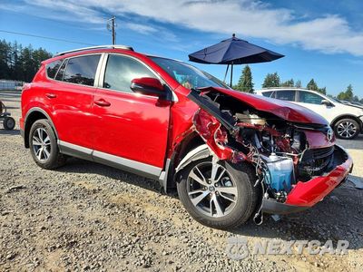 Czwarte zdjęcie samochodu z boku: 2016 TOYOTA RAV4 XLE VIN:2T3RFREV9GW463291 - miniatura