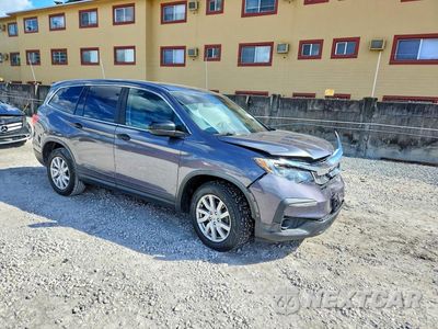 Czwarte zdjęcie samochodu z boku: 2020 HONDA PILOT LX VIN:5FNYF5H19LB025867 - miniatura