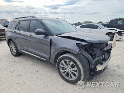 Czwarte zdjęcie samochodu z boku: 2021 FORD EXPLORER XLT VIN:1FMSK7DH3MGA71343 - miniatura