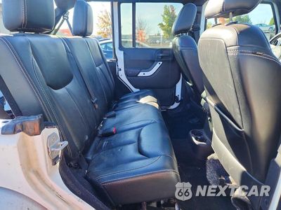 Zdjęcie 10 z 12 samochodu: 2014 JEEP WRANGLER UNLIMITED SAHARA VIN:1C4HJWEG6EL174637 - miniatura