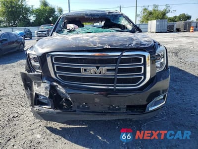 Piąte zdjęcie samochodu w środku: 2018 GMC YUKON SLE VIN:1GKS1AKC0JR226379 - miniatura