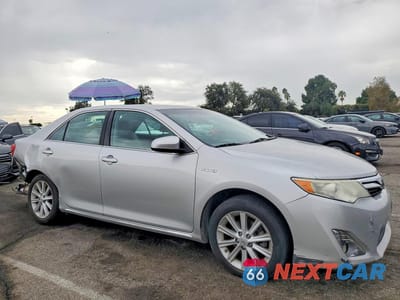 Czwarte zdjęcie samochodu z boku: 2014 TOYOTA CAMRY HYBRID XLE VIN:4T1BD1FK8EU133872 - miniatura