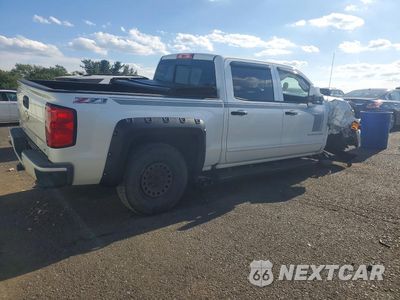 Trzecie zdjęcie samochodu z tyłu: 2017 CHEVROLET SILVERADO K1500 LT VIN:3GCUKREC4HG321002 - miniatura