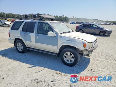 Czwarte zdjęcie samochodu z boku: 2001 NISSAN PATHFINDER SE VIN:JN8DR09X71W572323 - miniatura