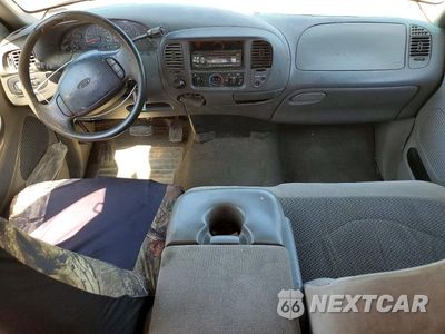 Zdjęcie 8 z 12 samochodu: 1999 FORD F150 VIN:1FTRX18L3XNB52665 - miniatura