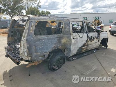 Trzecie zdjęcie samochodu z tyłu: 2017 CHEVROLET SUBURBAN C1500 PREMIER VIN:1GNSCJKC5HR398477 - miniatura